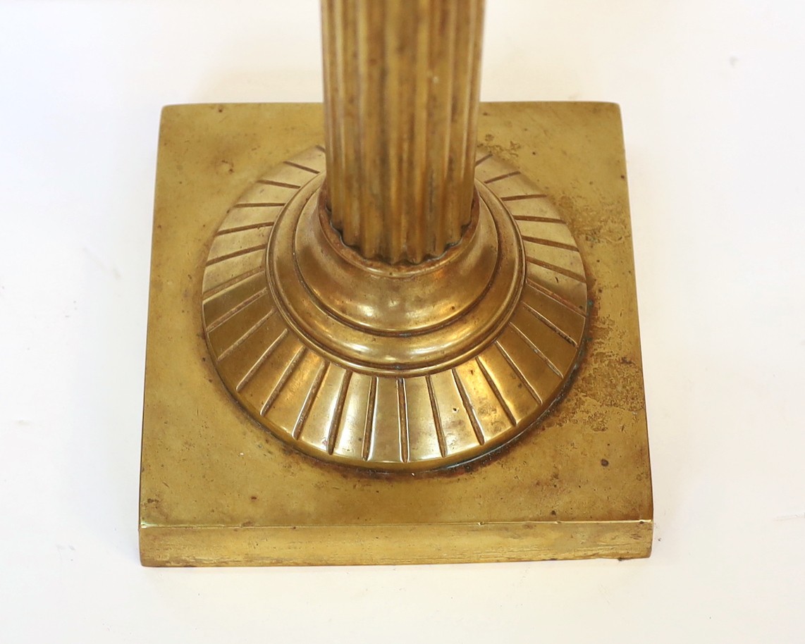 A late Victorian brass and cut glass oil lamp with Hinks and Son mechanism, spiral fluted globe and flue, height overall 74cm